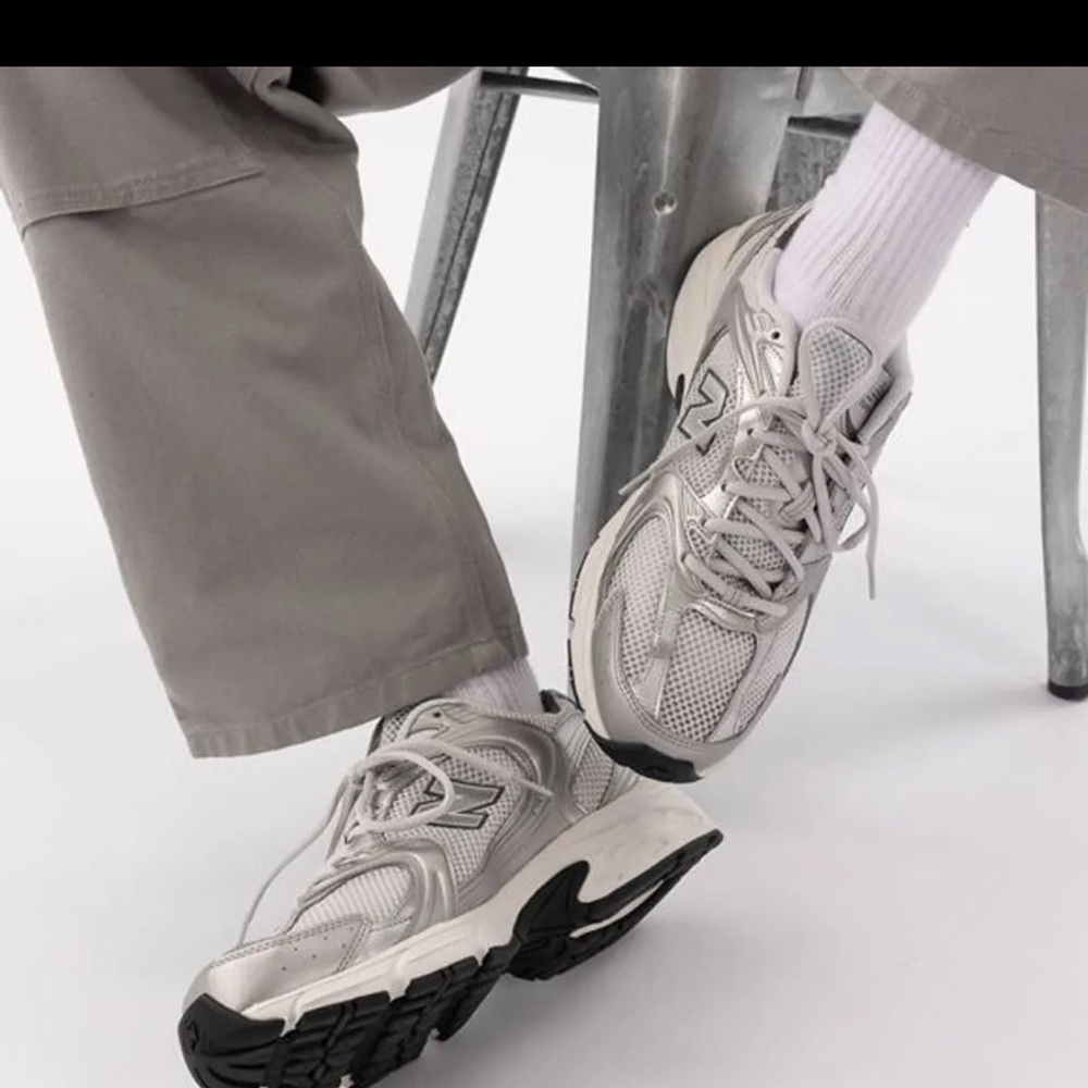 New Balance Silver and Black Athletic Shoes